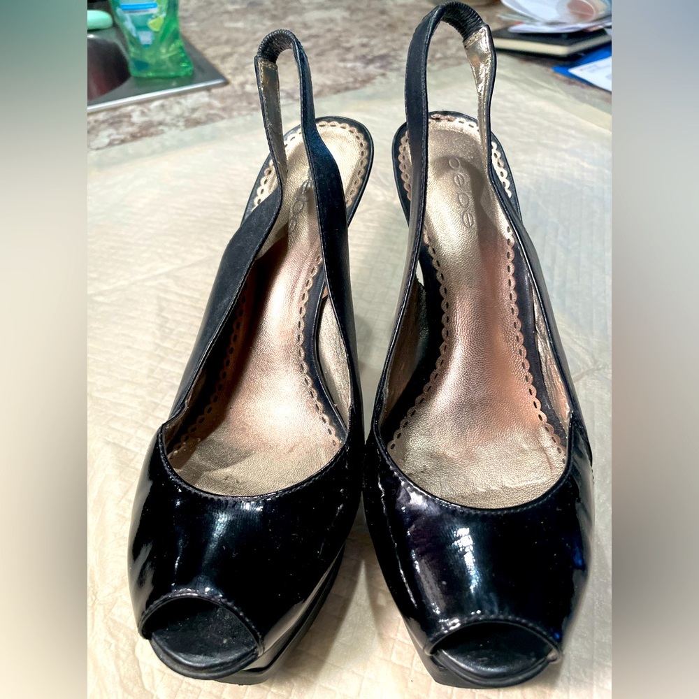 BEBE Black Patent Open Toed Platform Heels
Size 8